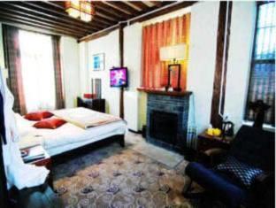 Lijiang Shishan Zhuyuan Hotel Екстер'єр фото
